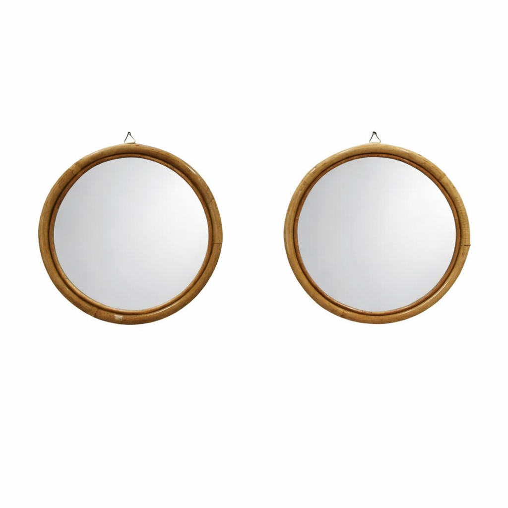 pair of round bamboo mirrors