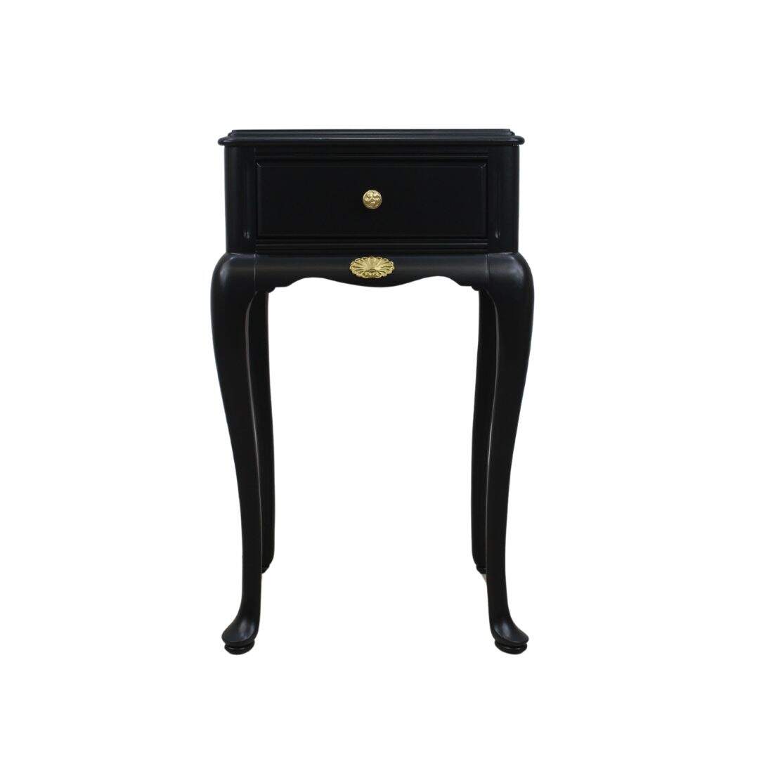 black night table with curvy legs