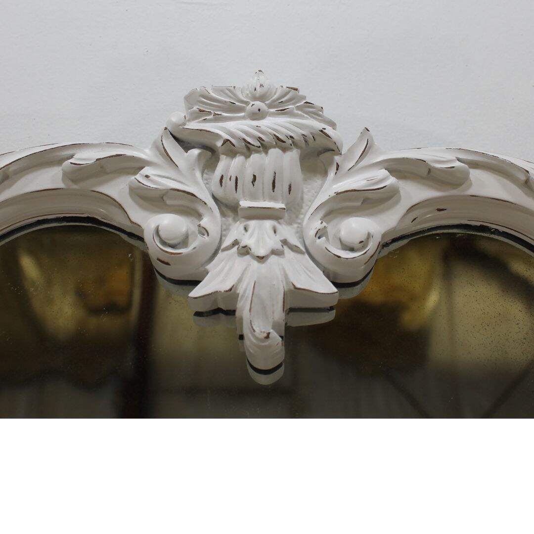 white carved wooden mirror