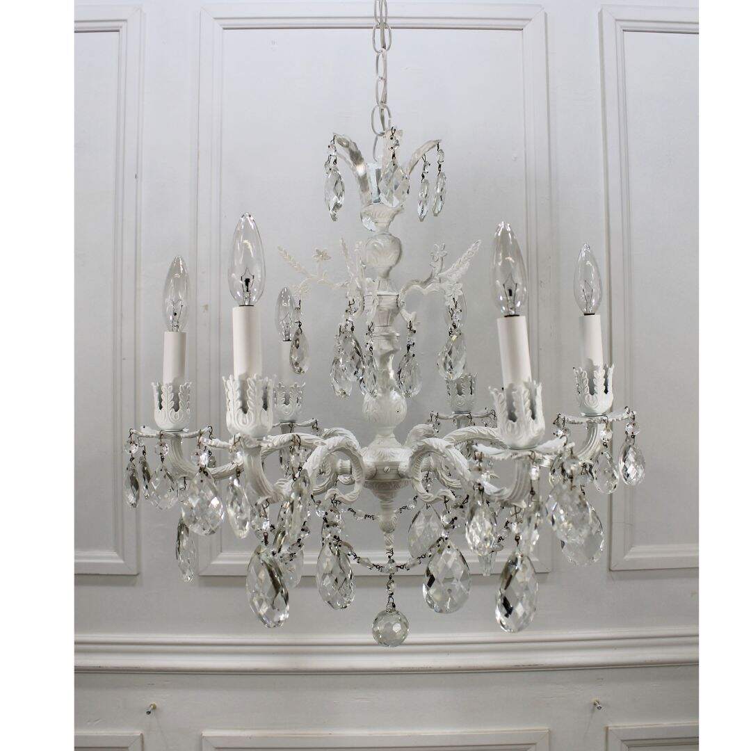 white chandelier with crystals