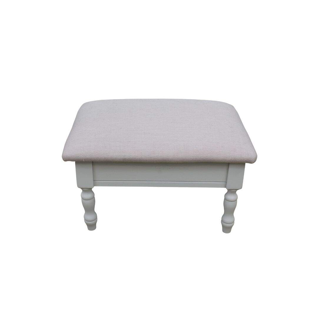 footstool with pink linen