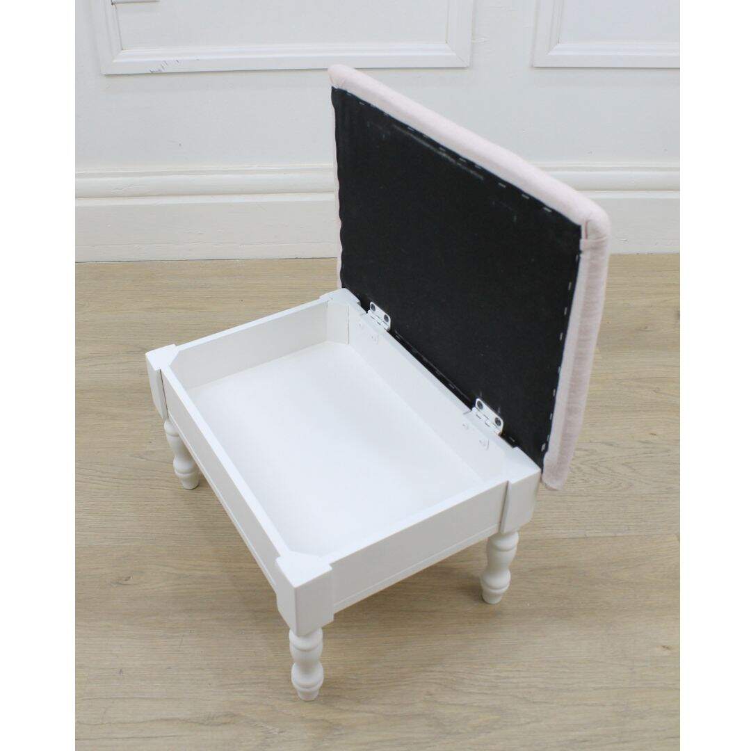footstool with pink linen