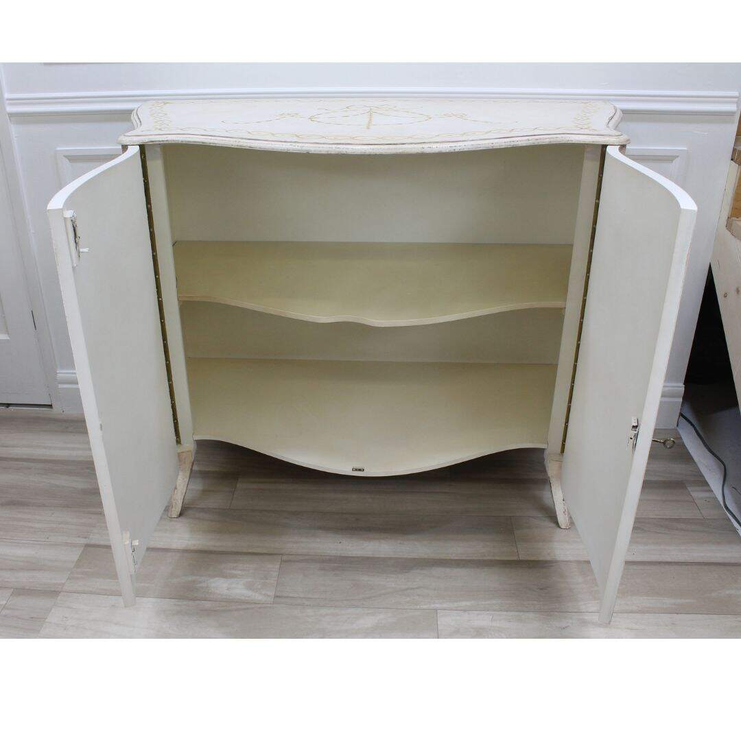 Bombe shaped cabinet with handpainting