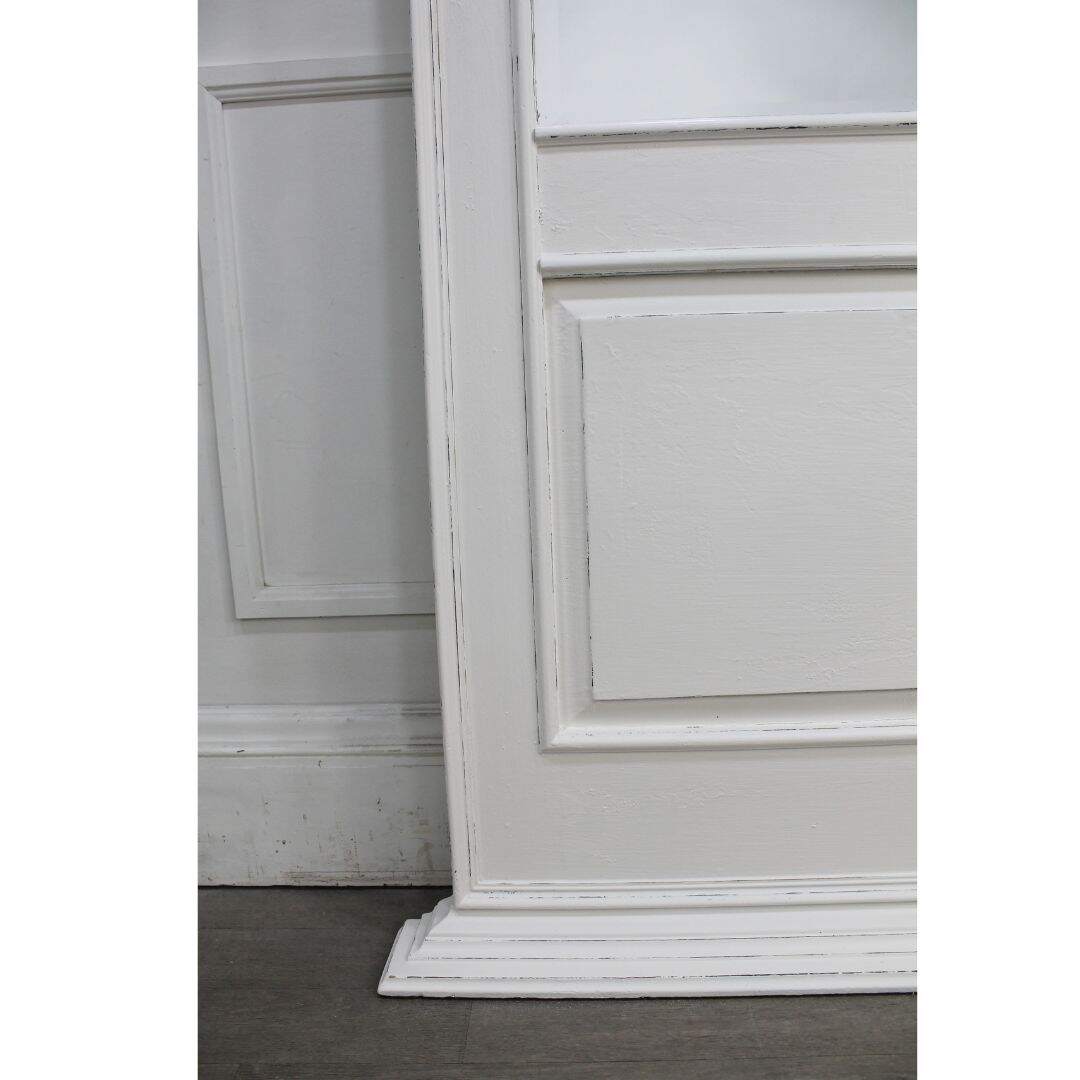 Large leaning painted pine mirror with moulding