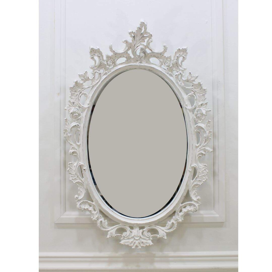 Ornate oval mirror