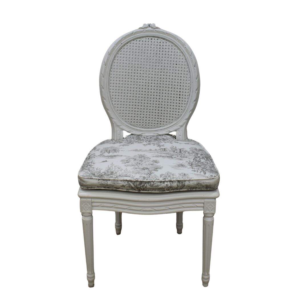 Oval back caned chair with toile cushion