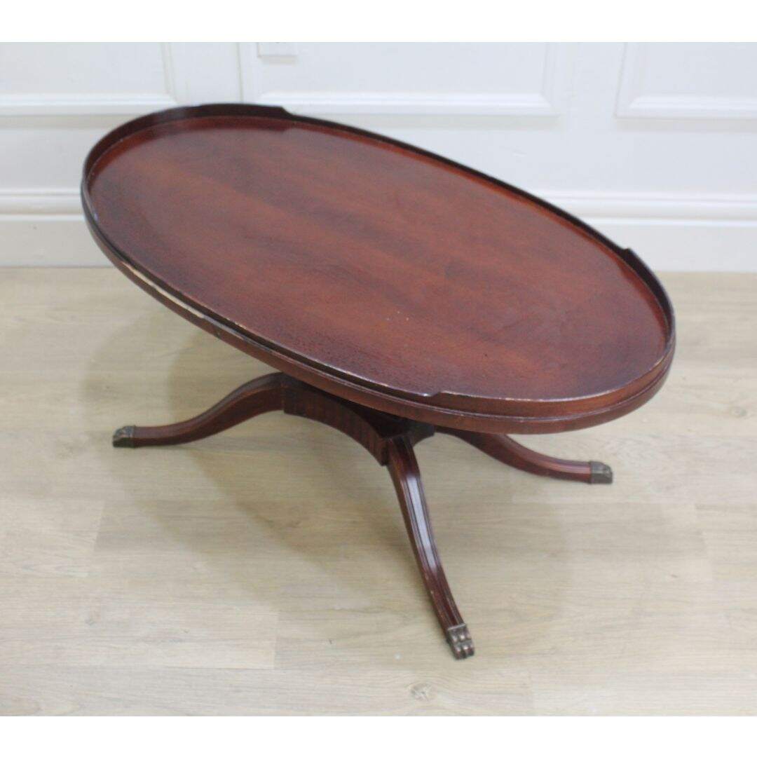 Oval lyre base coffee table
