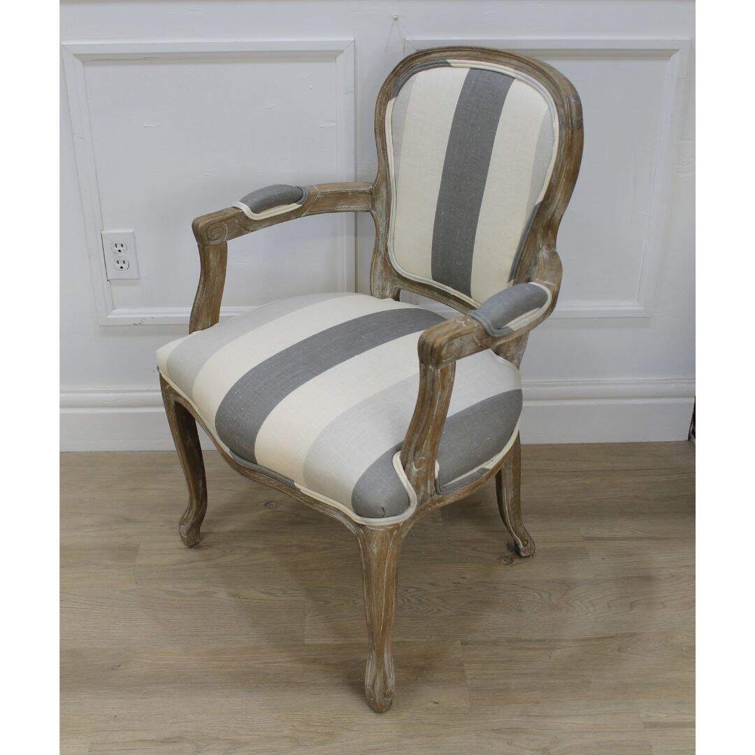 pair bergere chairs with striped linen