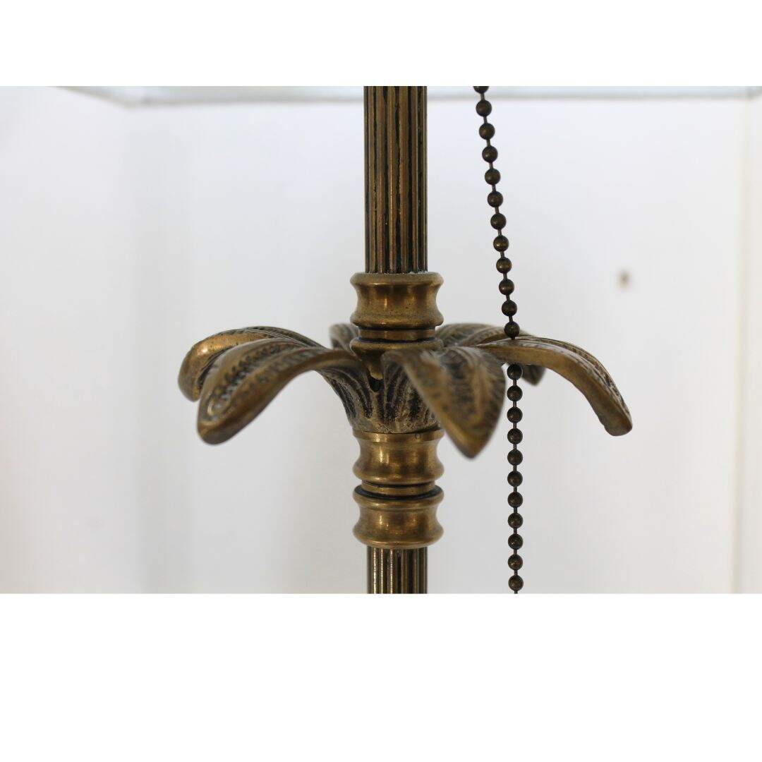 Pair of brass candlstick lamps with palm leaf detail