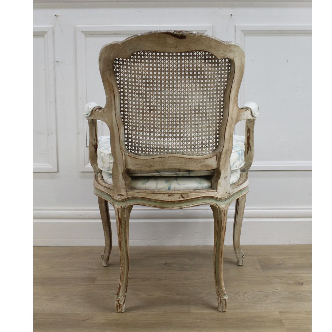 french caned back chair with blossom fabric