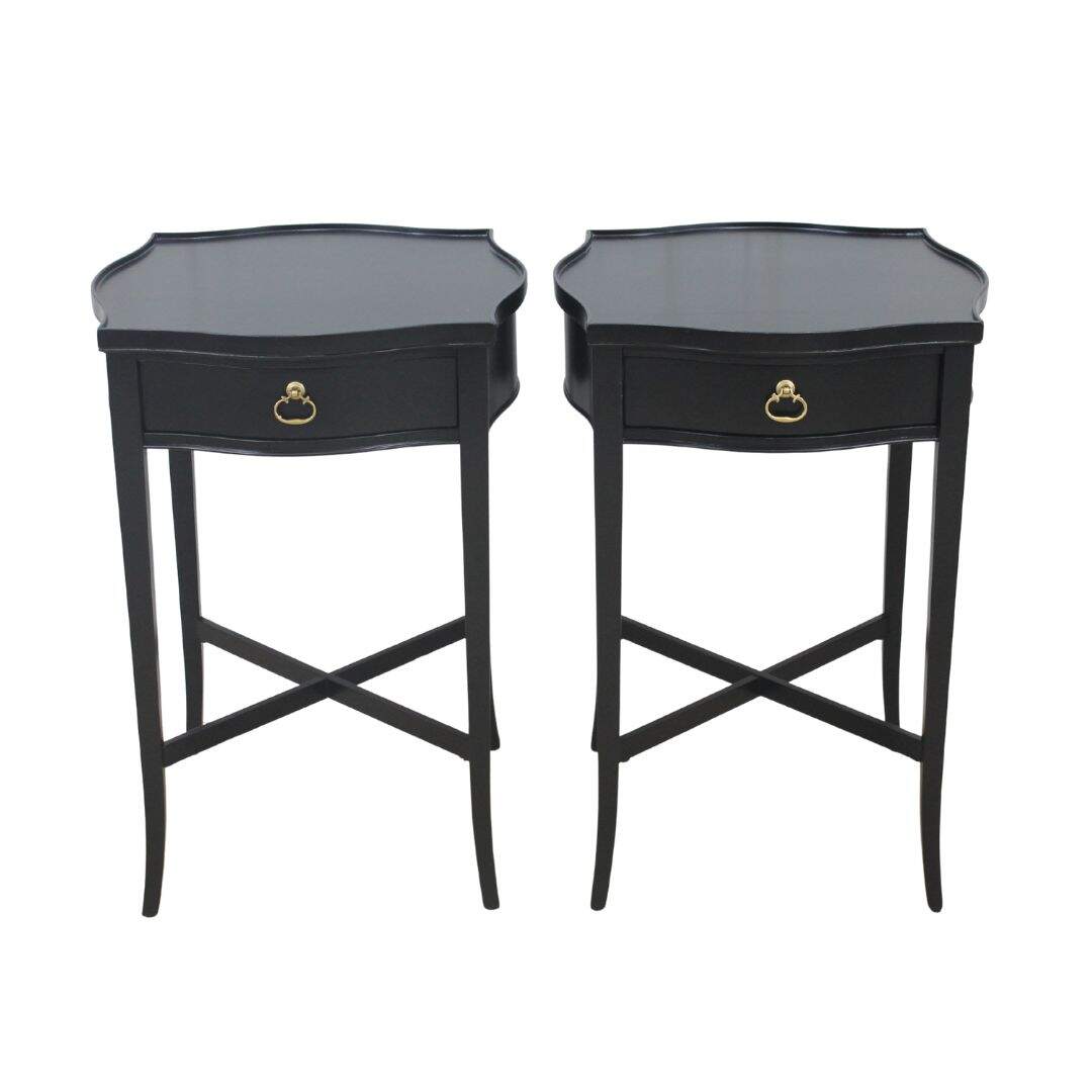 Pair of elegant black side tables with long legs