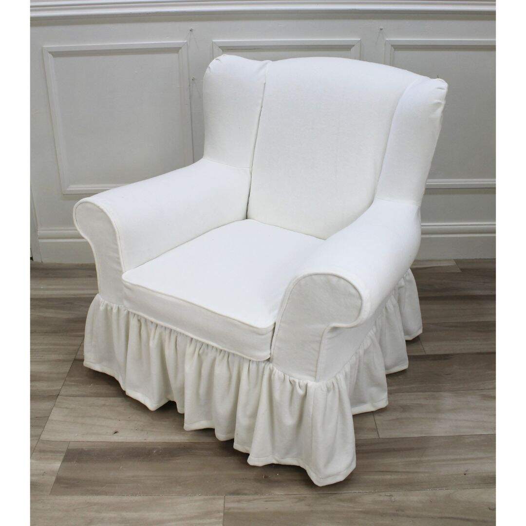 Slipcovered wing chair