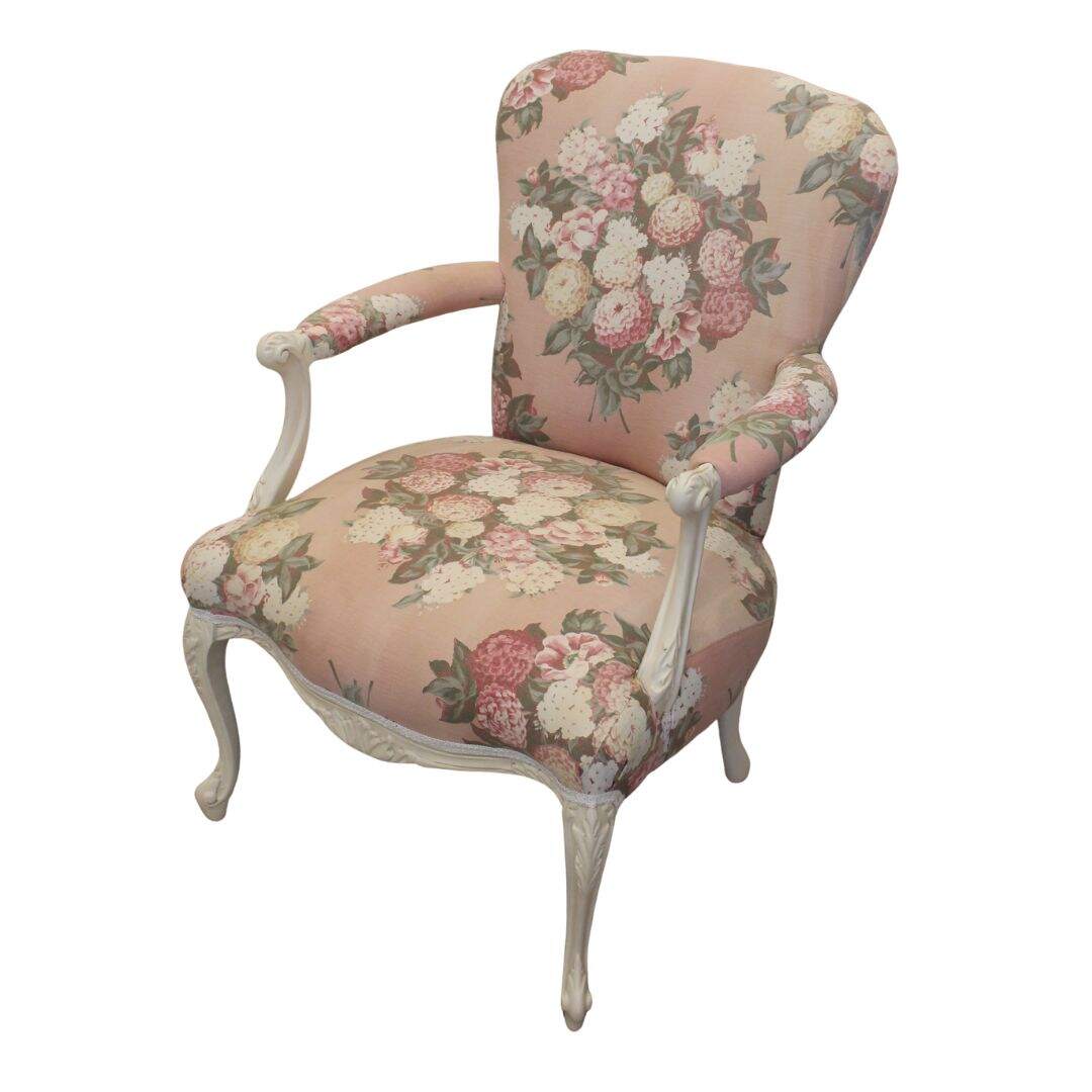 vintage chair with faded floral fabric