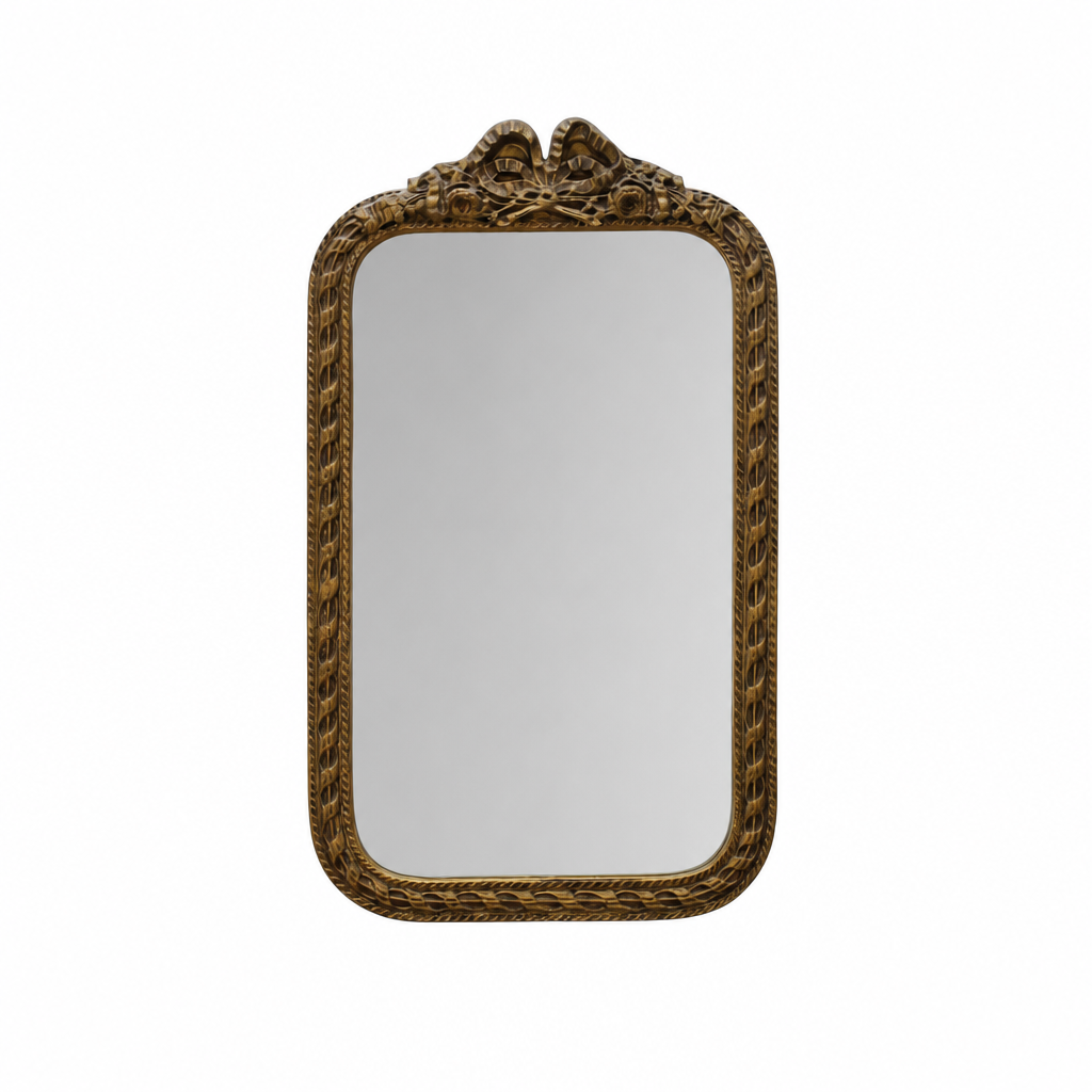 gold mirror with ribbon detail