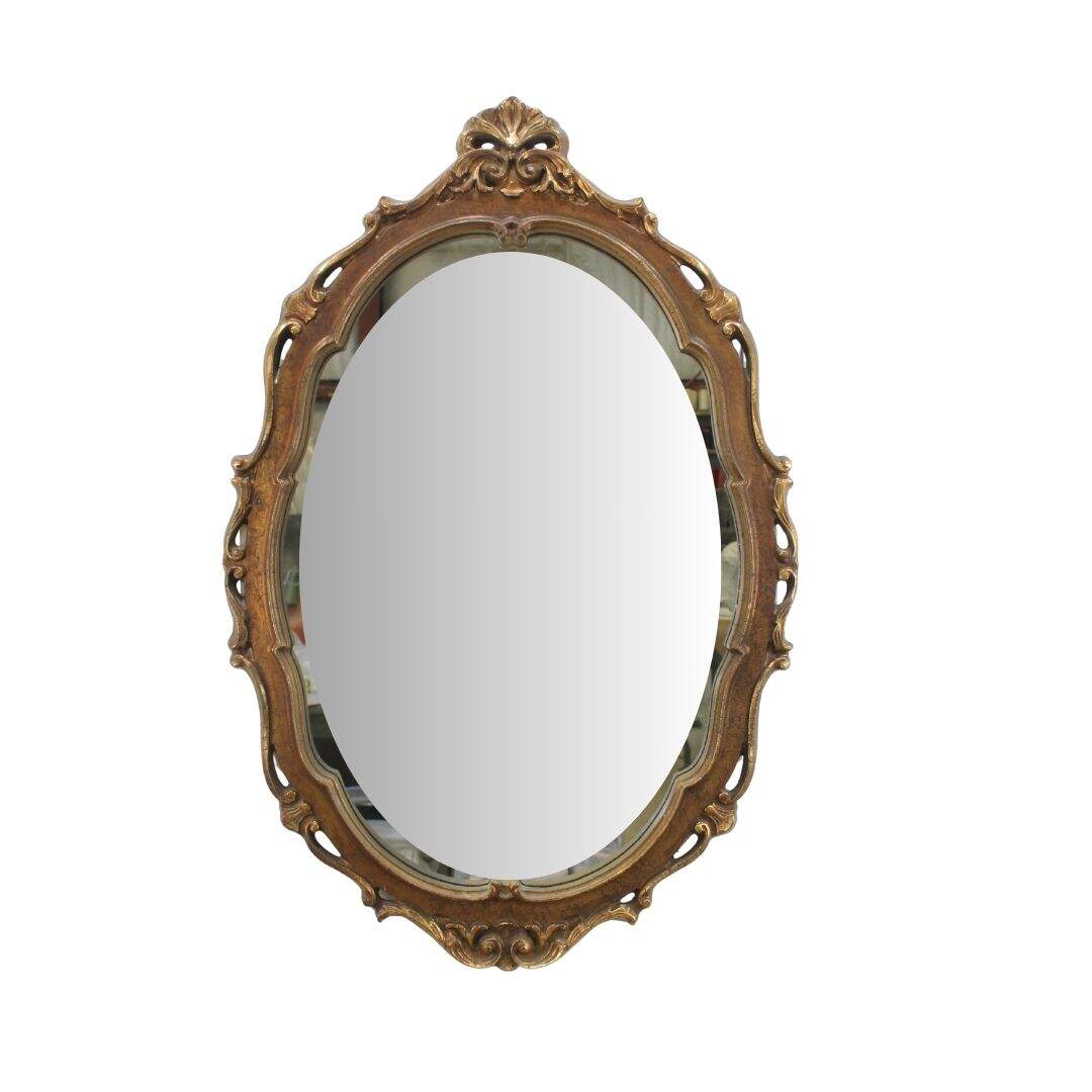 Oval gold ornate mirror