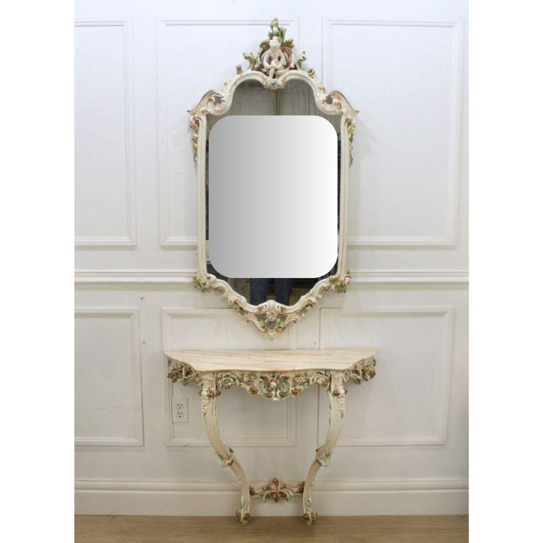 carved mirror and matching hall table from Italy