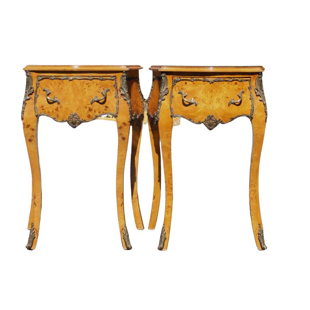 Pair French style burled walnut nightstands with ormulu
