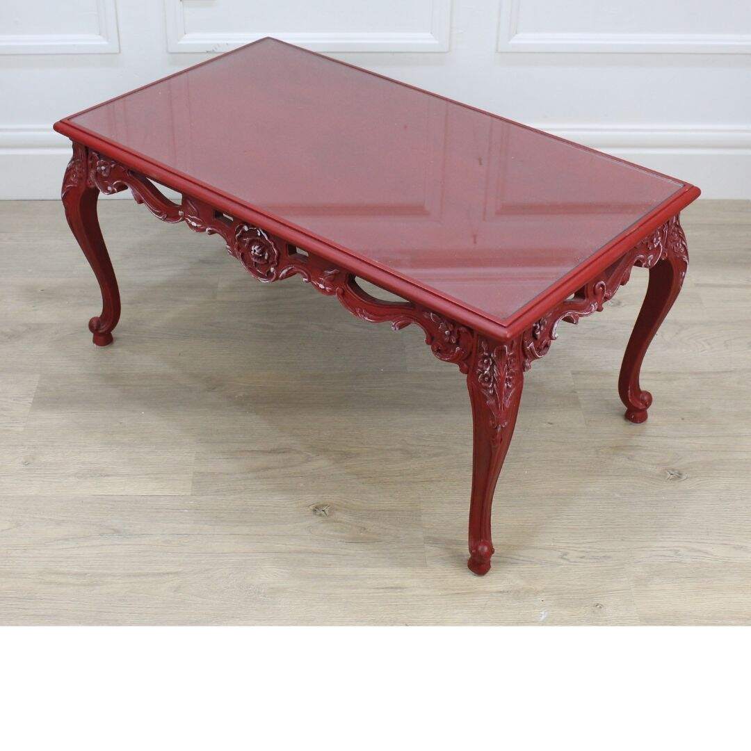 red carved coffee table