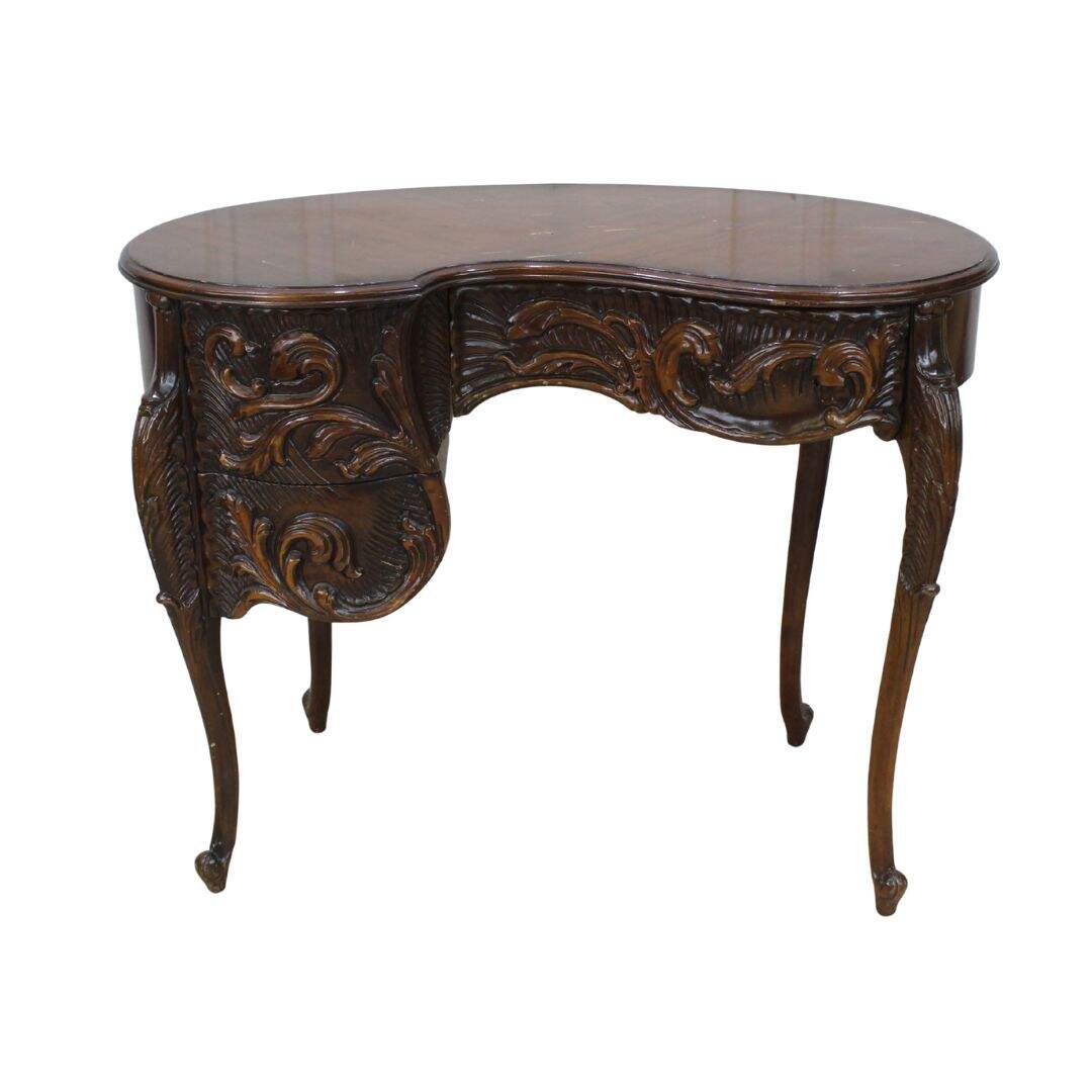 ornately carved asymmetrical vanity/desk, unpainted