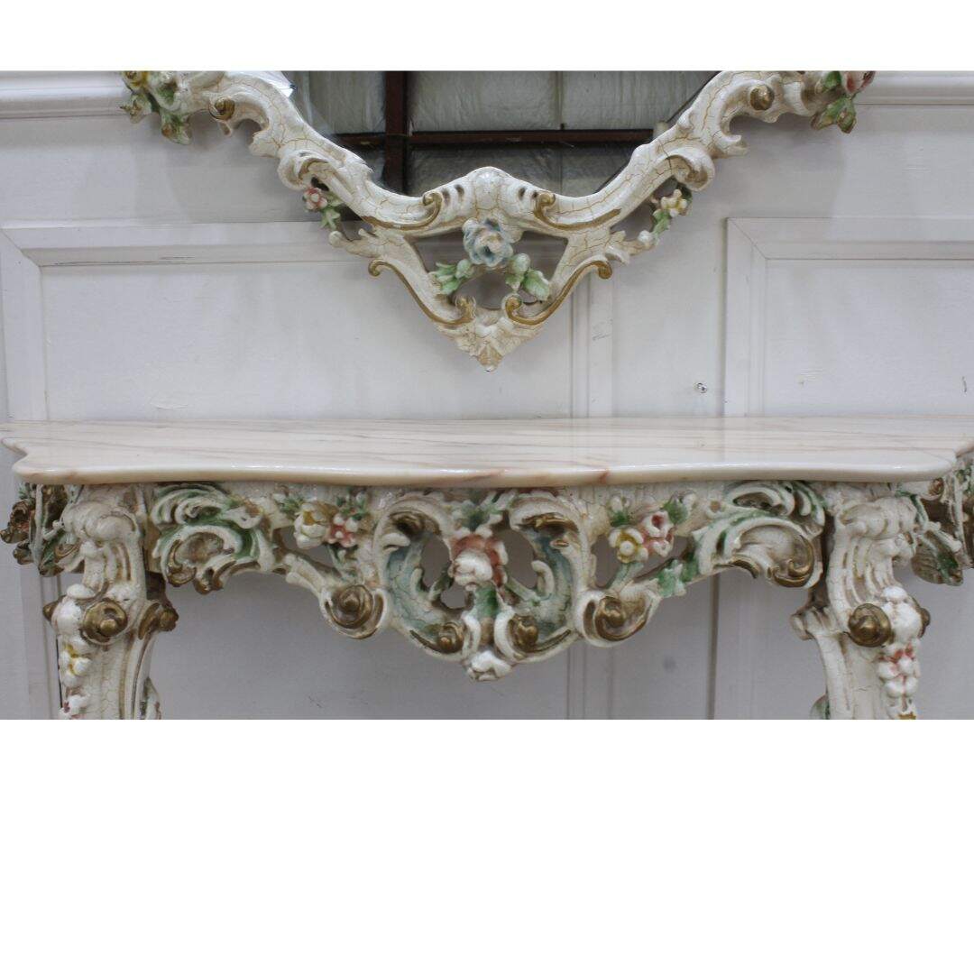 carved mirror and matching hall table from Italy
