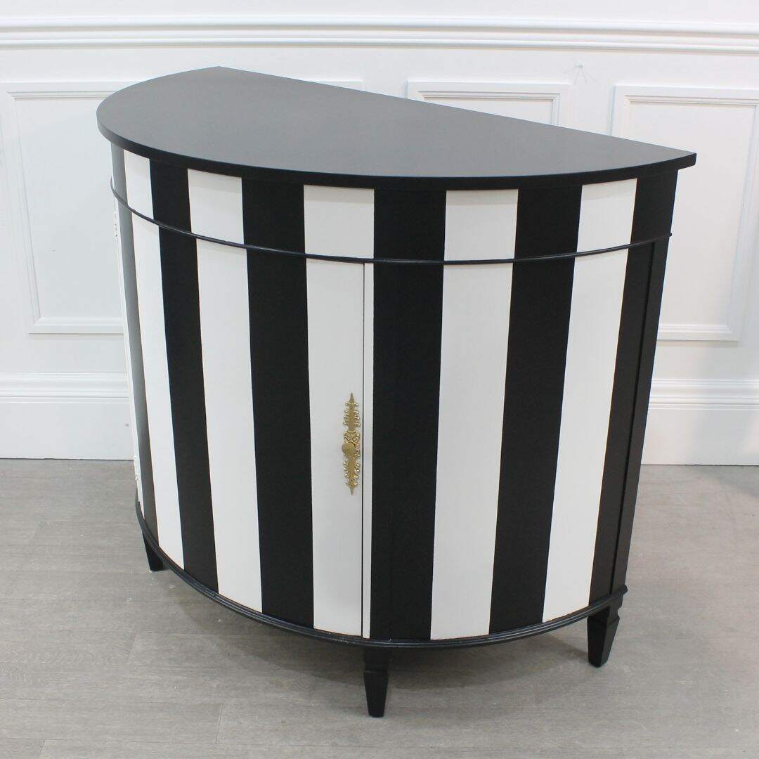 Demi lune cabinet with black and white stripes