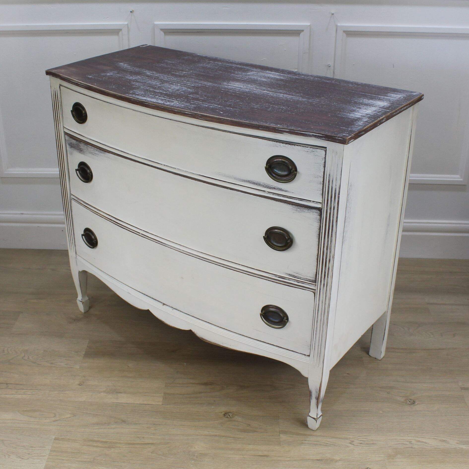 Distressed bow front dresser