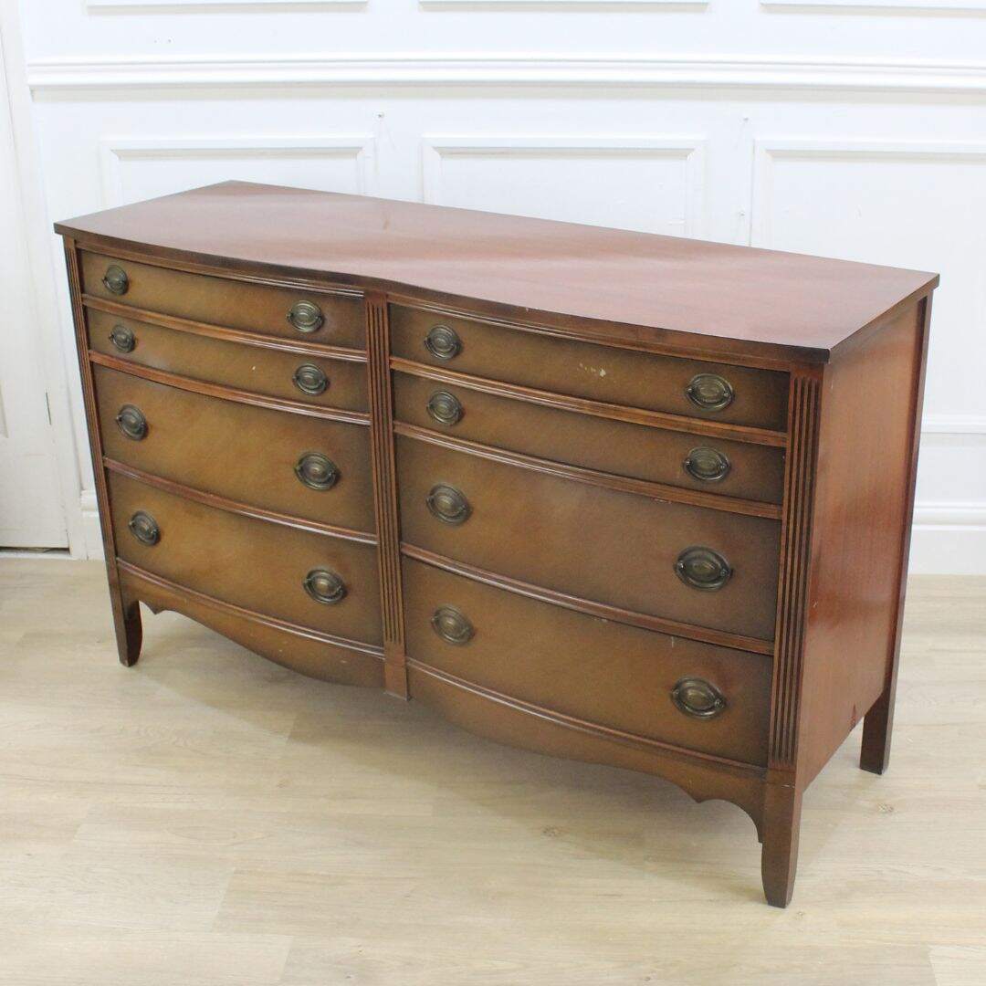 8 drawer double bow front dresser, unpainted
