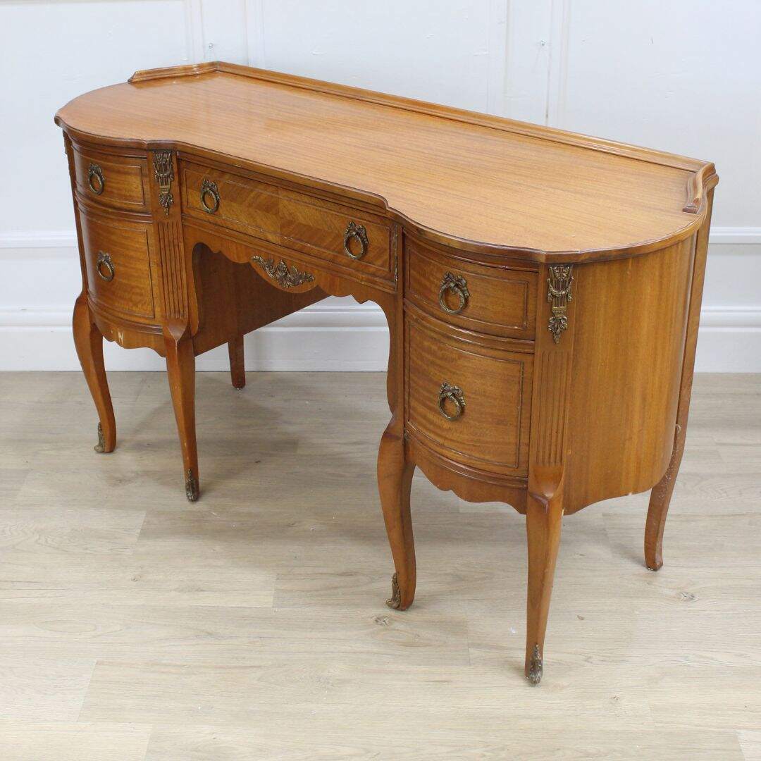 elegant vanity with brass details