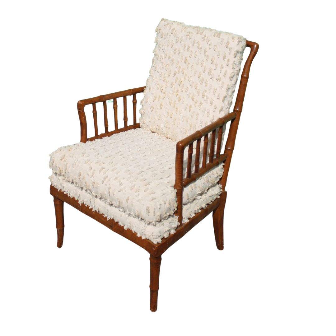 faux bamboo chair with beige cotton cushions
