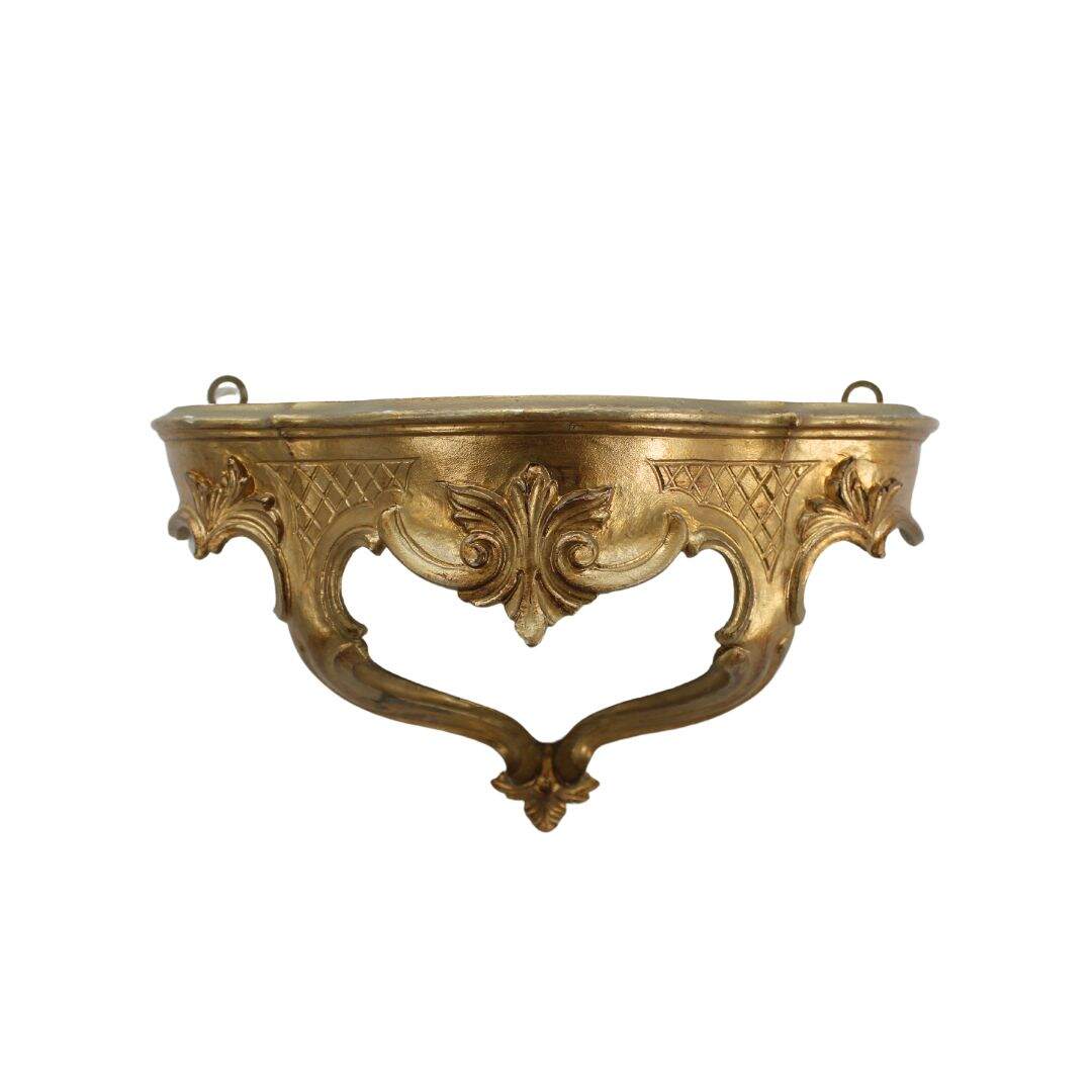 ornate gold wall shelf