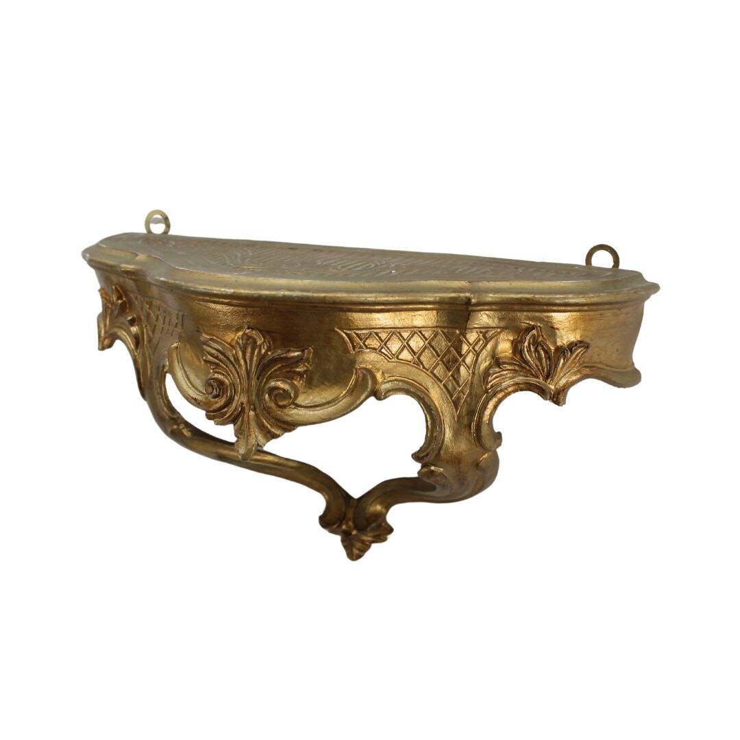 ornate gold wall shelf
