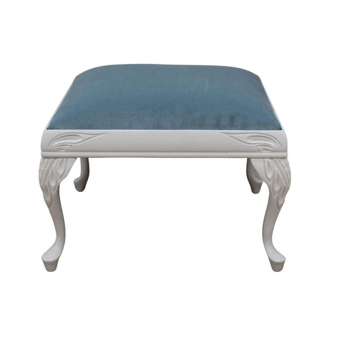 Ottoman with carved legs and pale blue velvet