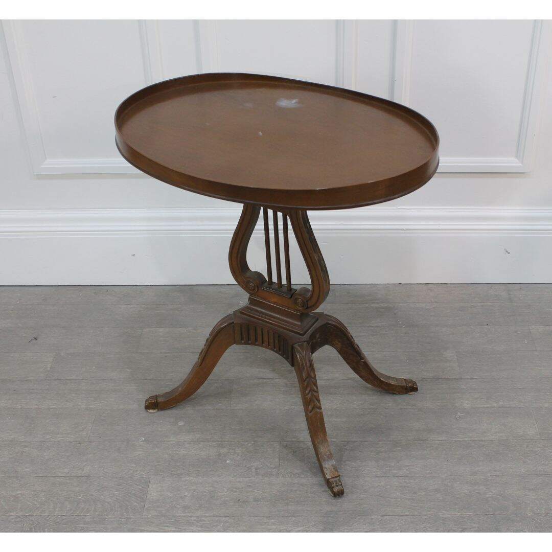 Oval lyre base side table