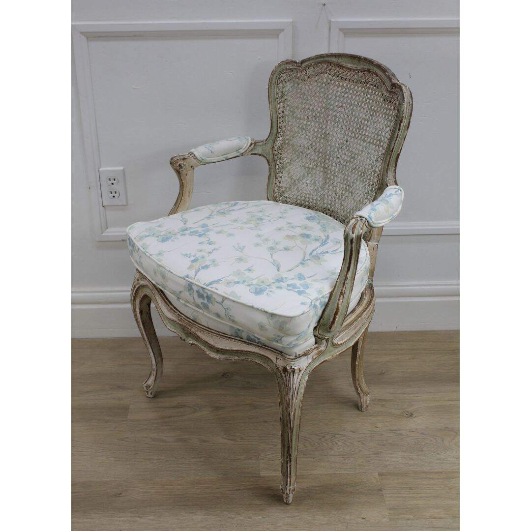 french caned back chair with blossom fabric