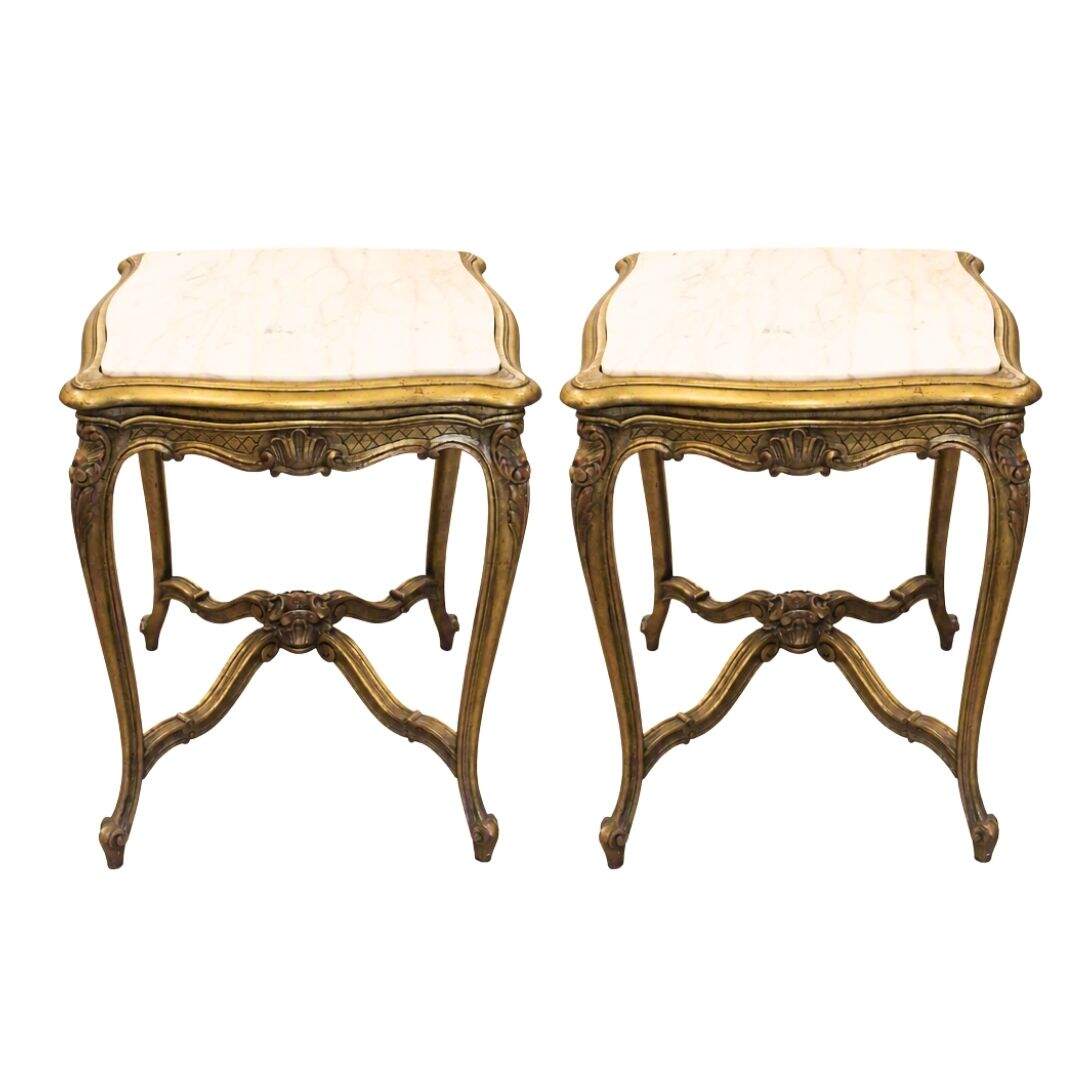 Pair of French gold side tables with marble tops