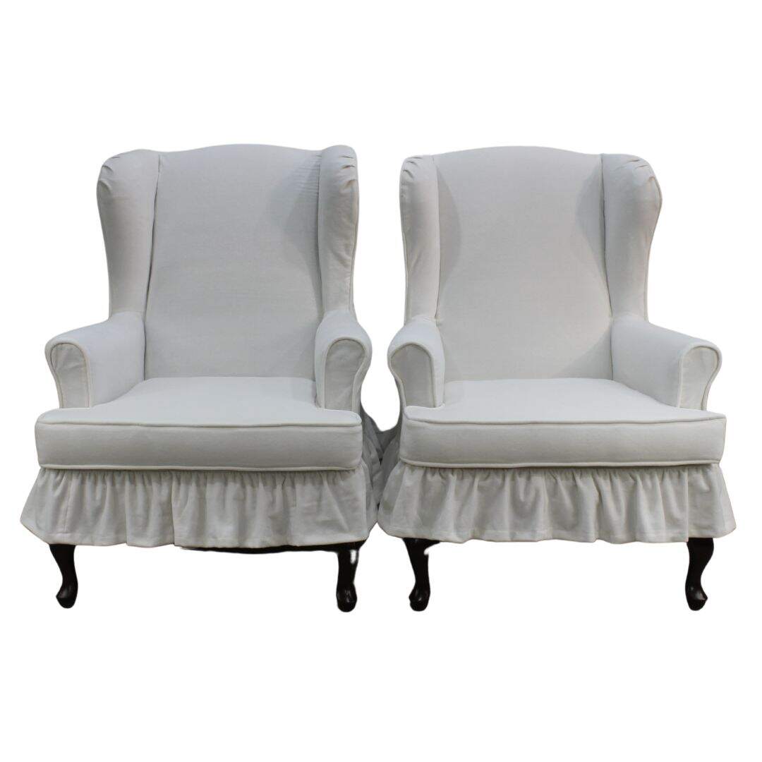 Pair of slipcovered wing chairs