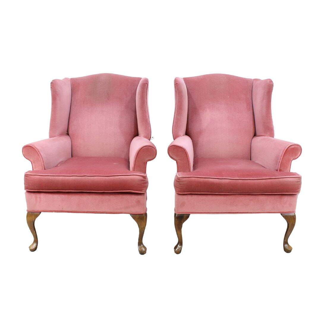 Pair of pink velvet wing chairs