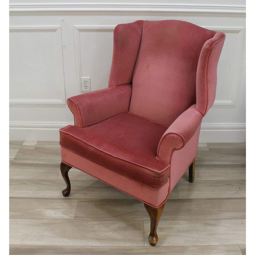 Pair of pink velvet wing chairs