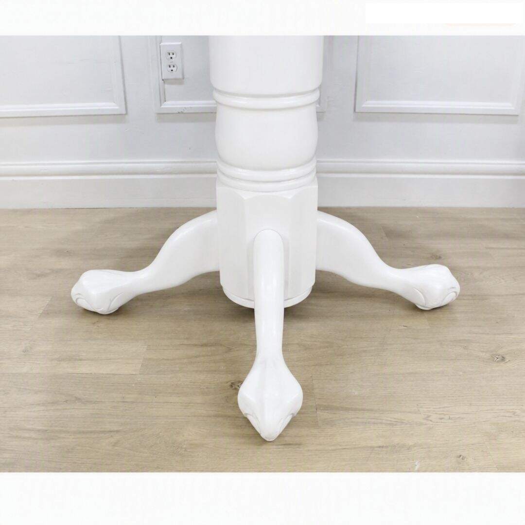 Round pedestal dining table