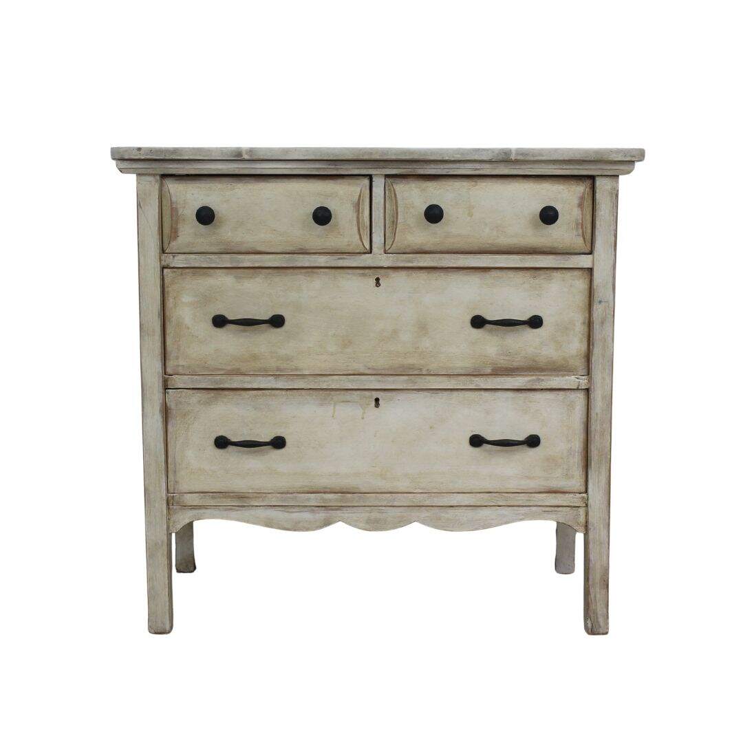 small dresser with antiqued finish