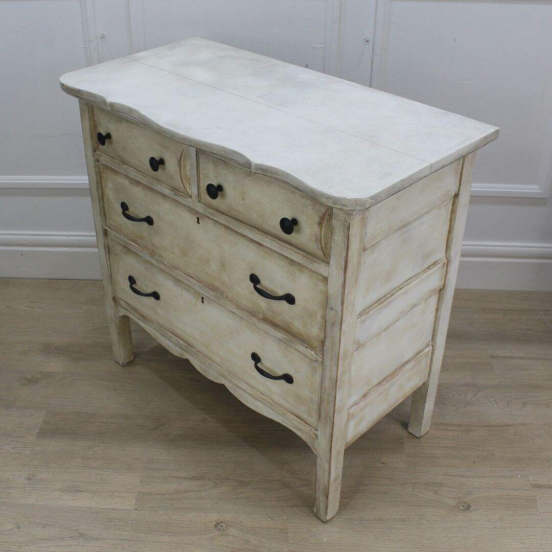 small dresser with antiqued finish