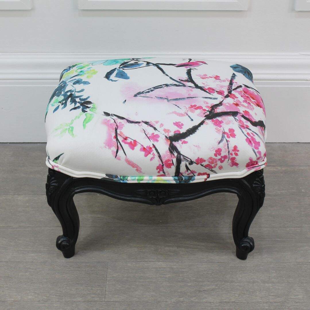 Small footstool with blossom fabric