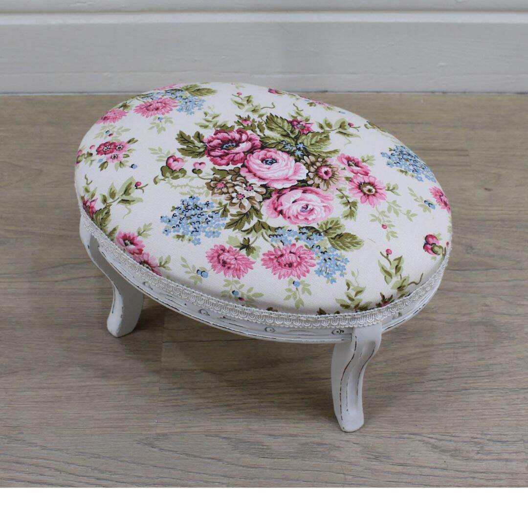 tiny oval stool with floral fabric