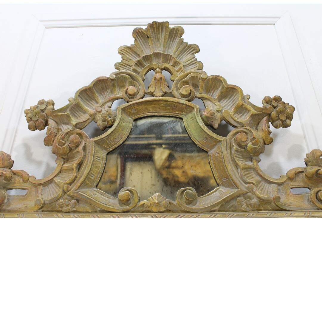 carved ornate wooden mirror