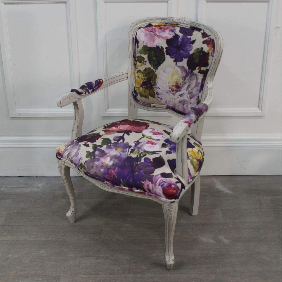 Pair of floral bergere chairs with floral fabric