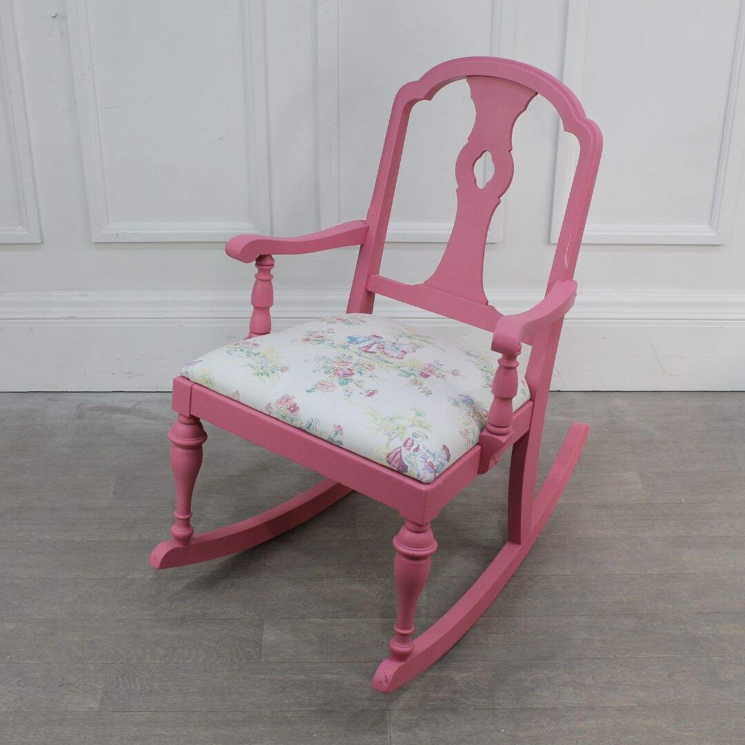 Child sized pink rocking chair